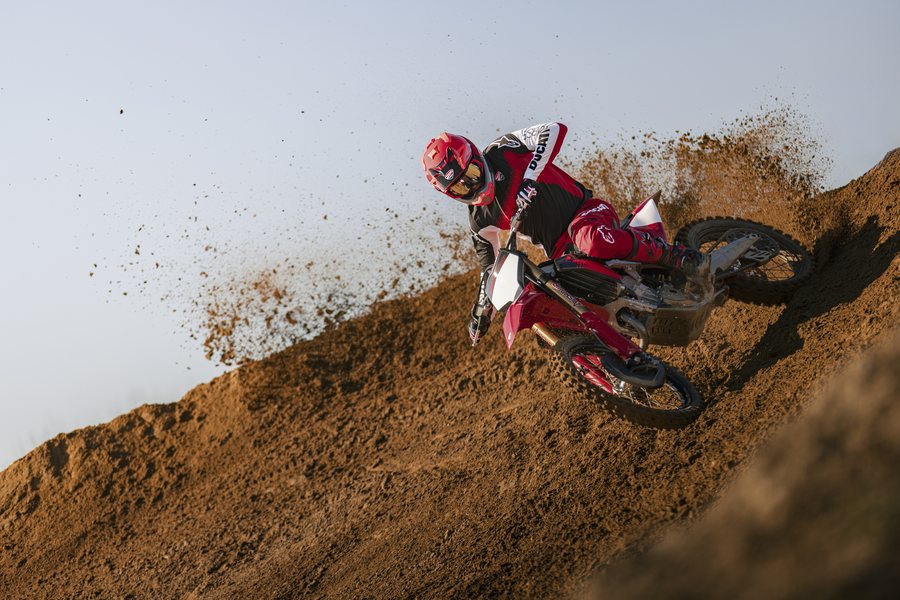 Ducati Desmo450 MX railing a berm