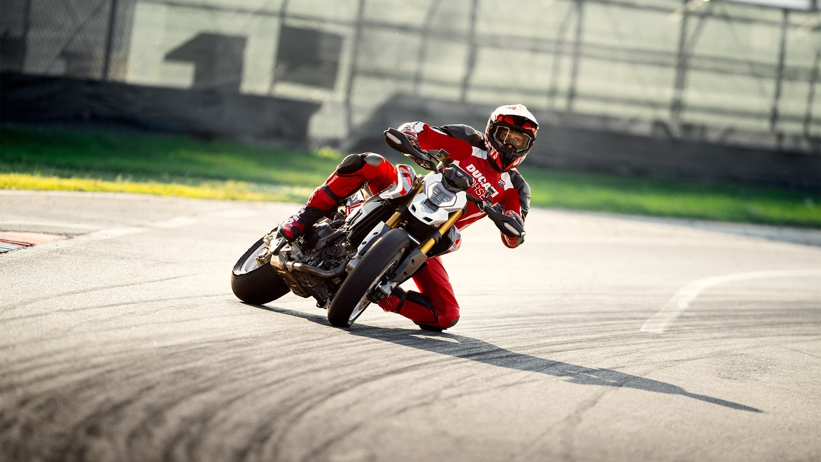 Ducati Hypermotard V2 leaned over on a kart track