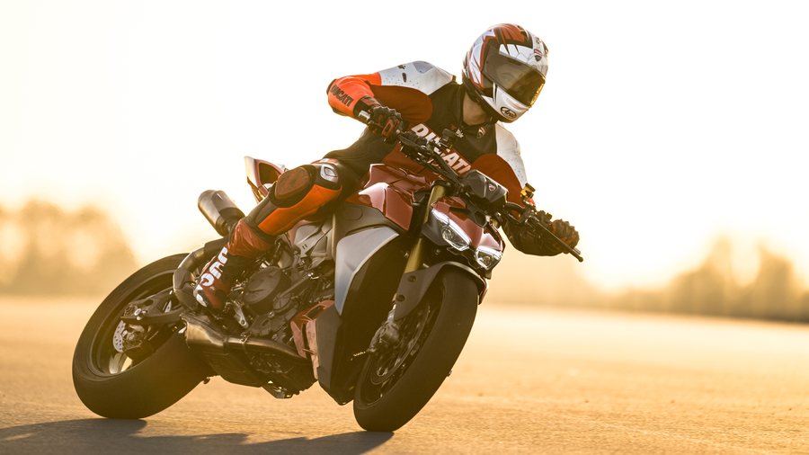 Ducati Streetfighter V2 cornering at golden hour